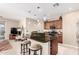 Stylish kitchen featuring a breakfast bar, pendant lighting, and stainless steel appliances at 16601 S 16Th Dr, Phoenix, AZ 85045