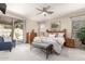 Serene main bedroom with natural light, patio access, and comfortable furnishings at 16601 S 16Th Dr, Phoenix, AZ 85045
