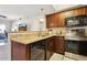 Well-lit kitchen featuring granite countertops and stainless steel appliances at 1720 E Thunderbird Rd # 2090, Phoenix, AZ 85022