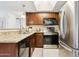 Modern kitchen featuring stainless steel appliances and granite countertops at 1720 E Thunderbird Rd # 2090, Phoenix, AZ 85022