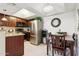 Open-concept kitchen with stainless steel appliances and adjacent dining area at 1720 E Thunderbird Rd # 2090, Phoenix, AZ 85022