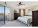 Comfortable bedroom with sliding glass doors to a private balcony at 1720 E Thunderbird Rd # 2090, Phoenix, AZ 85022