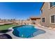 Backyard pool area, featuring desert landscaping at 1784 S 236Th Dr, Buckeye, AZ 85326