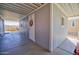 Enclosed carport with door and window to home offering parking and storage at 2263 N Trekell Rd # 21, Casa Grande, AZ 85122