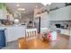 Open kitchen with stainless steel appliances, breakfast bar and seamless access to the dining and living areas at 2263 N Trekell Rd # 21, Casa Grande, AZ 85122