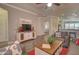 Comfortable living room with stylish furniture, TV, and an open floor plan at 2263 N Trekell Rd # 21, Casa Grande, AZ 85122