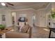 Open-concept living room featuring modern decor and seamless flow to other areas of the home at 2263 N Trekell Rd # 21, Casa Grande, AZ 85122