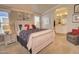 Inviting main bedroom with a calming color palette, plush carpet and a doorway to the bathroom at 2263 N Trekell Rd # 21, Casa Grande, AZ 85122