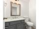 Modern bathroom featuring updated vanity, mirror, and fixtures at 2277 S Apache Dr # 7, Apache Junction, AZ 85120