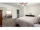A spacious bedroom with a mirrored closet and warm neutral color palette at 2277 S Apache Dr # 7, Apache Junction, AZ 85120