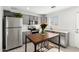 Well-lit kitchen features stainless steel appliances, gray cabinets, and plenty of counter space at 2277 S Apache Dr # 7, Apache Junction, AZ 85120