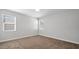 Cozy bedroom featuring neutral paint colors and plush carpet at 2296 S 235Th Dr, Buckeye, AZ 85326