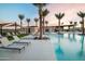 Charming pool area with inviting lounge chairs and covered ramada for shaded relaxation at 23146 E Nightingale Rd, Queen Creek, AZ 85142