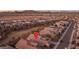 Aerial view showing homes in the community with desert landscaping and mountain views, located near a community playground at 25330 N 134Th Dr, Peoria, AZ 85383