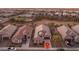 Aerial view of a residential community, showcasing well-maintained homes with desert landscaping and nearby community amenities at 25330 N 134Th Dr, Peoria, AZ 85383