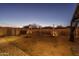 Private backyard space with a gazebo, garden and mature desert landscaping, perfect for tranquil outdoor living at 25330 N 134Th Dr, Peoria, AZ 85383