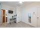 Empty bedroom with neutral colors, tile flooring, and a large window at 25330 N 134Th Dr, Peoria, AZ 85383
