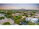 A beautiful community with lush trees features mountain views at 2799 E Jade Pl, Chandler, AZ 85286