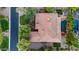 An aerial view of the house shows the red tiled roof, pool, and outdoor living space at 2799 E Jade Pl, Chandler, AZ 85286