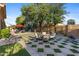 An outdoor patio features travertine flooring, a seating area and view of the pool at 2799 E Jade Pl, Chandler, AZ 85286