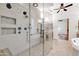 Luxurious bathroom features a glass-enclosed shower, soaking tub, and dual vanities at 2799 E Jade Pl, Chandler, AZ 85286
