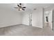 Bedroom featuring neutral carpet, ceiling fan, and open doorway to hallway at 2799 E Jade Pl, Chandler, AZ 85286