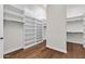 Spacious walk-in closet with custom shelving and ample storage, providing a luxurious and organized space at 2799 E Jade Pl, Chandler, AZ 85286