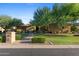 Beautifully landscaped home with a brick walkway leading to the front door at 2799 E Jade Pl, Chandler, AZ 85286