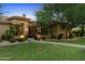 Charming front yard with lush green grass, mature trees, and a welcoming entrance at 2799 E Jade Pl, Chandler, AZ 85286