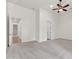 Spacious living room features neutral carpet and paint, ceiling fan, and recessed lighting at 2799 E Jade Pl, Chandler, AZ 85286