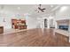Bright and airy living room featuring hardwood flooring, an elaborate fireplace, and recessed lighting at 2799 E Jade Pl, Chandler, AZ 85286