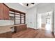 Bright office space with custom built-ins, hardwood flooring, and a built-in desk at 2799 E Jade Pl, Chandler, AZ 85286