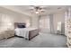 Serene bedroom with plantation shutters, offering a relaxing retreat and ample natural light at 3020 E Tiffany Way, Gilbert, AZ 85298