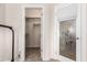 Walk in closet with rod and shelf storage and a decorative glass door at 3020 E Tiffany Way, Gilbert, AZ 85298