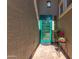 A stylish front door entrance featuring modern design elements and a welcoming ambiance for guests at 3020 E Tiffany Way, Gilbert, AZ 85298