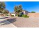 Home featuring manicured landscaping, a well-kept lawn, and a welcoming front entrance with sidewalk at 3020 E Tiffany Way, Gilbert, AZ 85298
