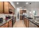 Well-equipped kitchen boasting granite countertops, stainless steel appliances, and plenty of cabinetry at 3020 E Tiffany Way, Gilbert, AZ 85298