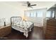 Cozy bedroom with natural light from shuttered windows and neutral decor at 357 E Las Puertas Ln, Queen Creek, AZ 85140