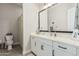 Bathroom featuring white vanity, modern fixtures, and a separate shower area at 4247 E Tonto Pl, Chandler, AZ 85249