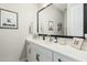 Tastefully decorated bathroom featuring white cabinetry and decorative accents at 4247 E Tonto Pl, Chandler, AZ 85249