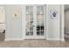 Flex space featuring beautiful french doors and wood-look flooring at 4247 E Tonto Pl, Chandler, AZ 85249
