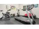 This home gym includes treadmills and other equipment at 4247 E Tonto Pl, Chandler, AZ 85249