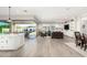 Open-concept living space with seamless indoor-outdoor flow and custom built-ins at 4247 E Tonto Pl, Chandler, AZ 85249