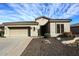 Charming single-story home with a well-manicured front yard and desert landscaping at 5405 S Marigold Way, Gilbert, AZ 85298