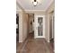 The entryway features decorative tile flooring and attractive lighting fixtures at 5405 S Marigold Way, Gilbert, AZ 85298