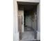 View of the front entryway with tile floors, decor, and secure gate at 5405 S Marigold Way, Gilbert, AZ 85298