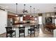 Spacious kitchen with granite island, stainless steel appliances, and ample cabinet space at 5405 S Marigold Way, Gilbert, AZ 85298