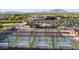 Aerial view of community pickleball courts, meticulously maintained and ready for friendly competition at 5405 S Marigold Way, Gilbert, AZ 85298