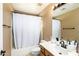 Bathroom featuring a shower-tub combo, and a light vanity at 5527 W Tonopah Dr, Glendale, AZ 85308