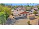 The property has a storage shed, well-kept lawn and mature trees at 6713 N 80Th Pl, Scottsdale, AZ 85250